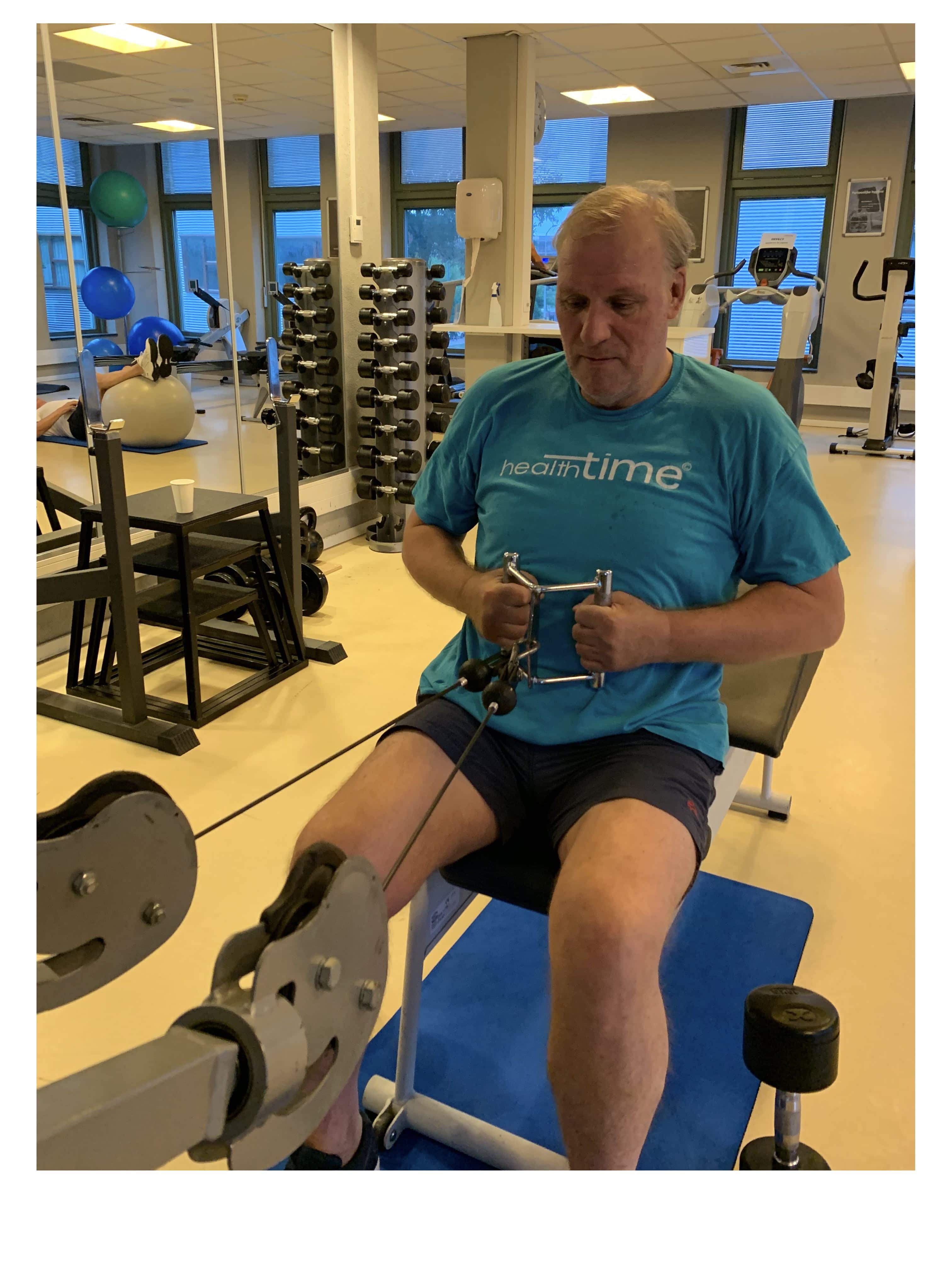 review healthtime tevreden sporter klant man pulley seated row